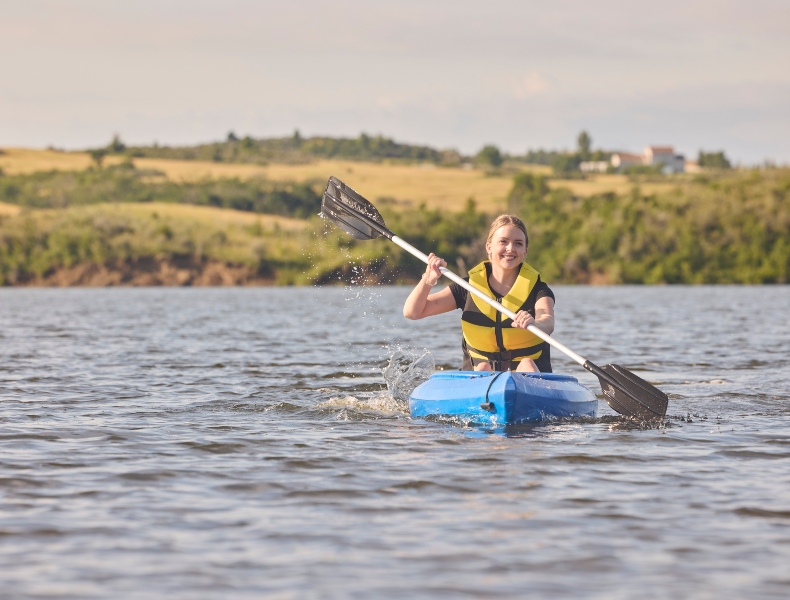Woman kayaking.
