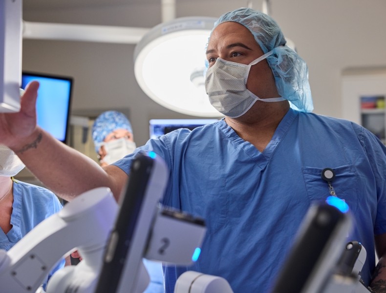 Medical professional checking the computer screen.
